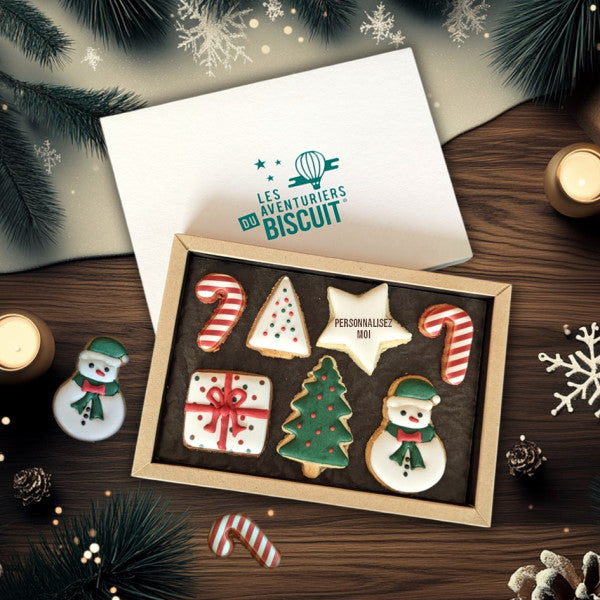 Coffret de biscuits artisanaux de Noël personnalisable 'Red & Green', aux couleurs traditionnelles de Noël, décorés à la main avec des motifs festifs comme des bonhommes de neige, sapins et cannes de bonbon, fabriqués par Les Aventuriers du Biscuit